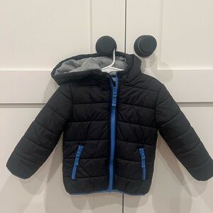 Black Puffer Jacket with Blue Accents